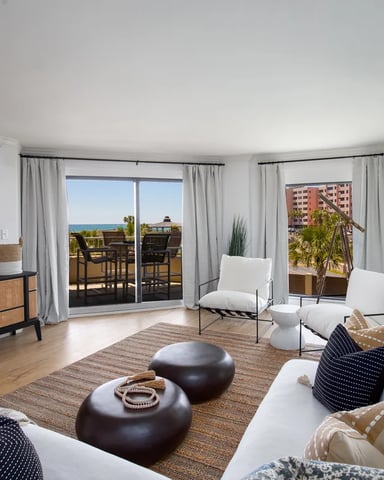 Beachfront condo building with Gulf views and resort pool