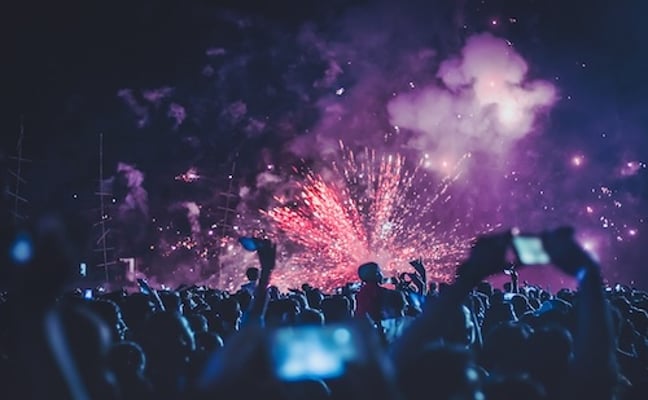 Fireworks lighting up the night sky at a block party